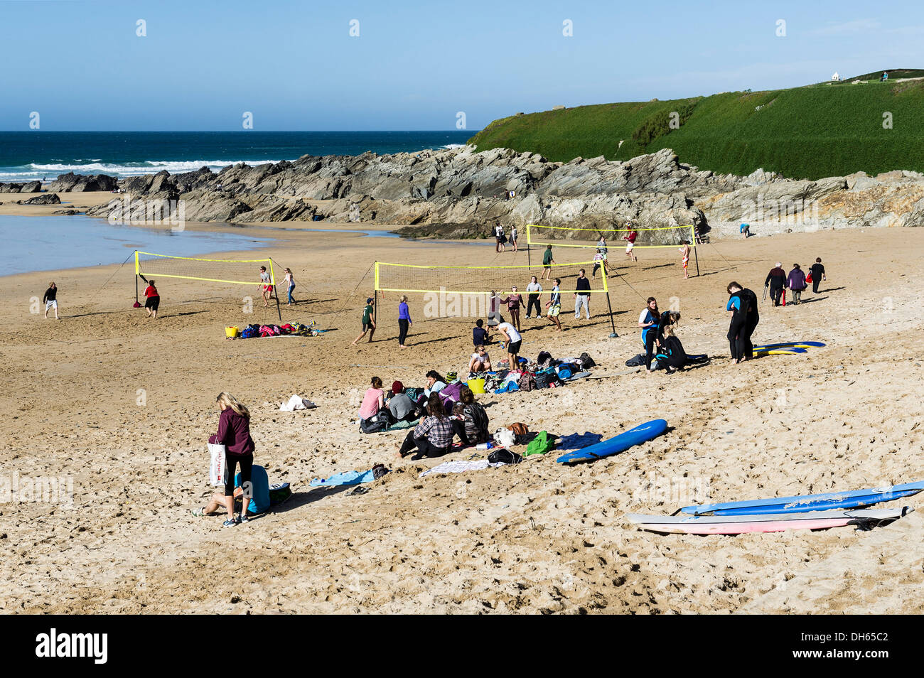Young people playing volleyball on Fistral Beach in Newquay. Stock Photo