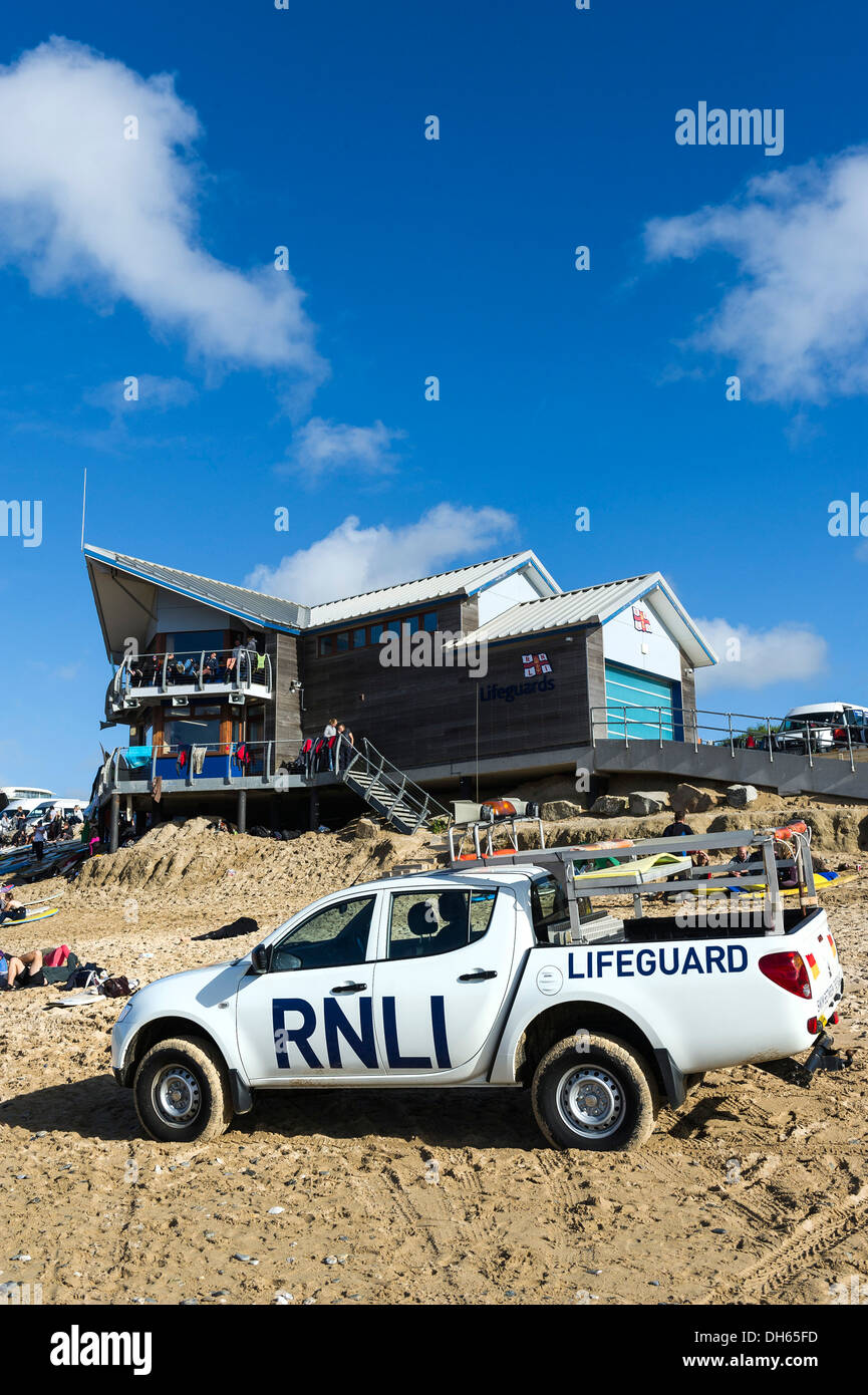 A RNLI Lifeguard truck parked on Fistral Beach. Stock Photo