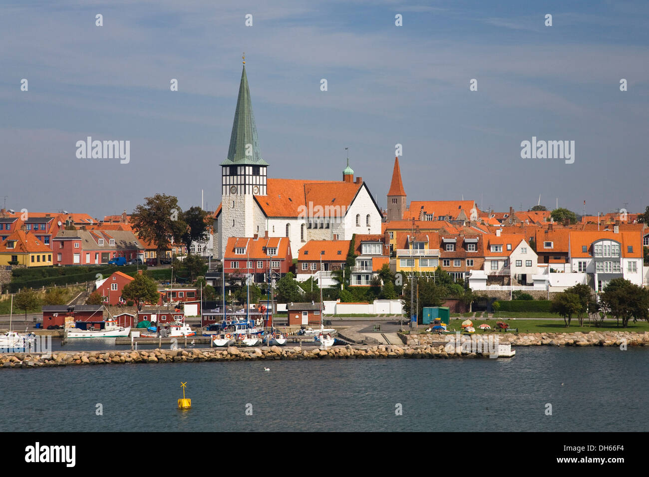 Timber-frame houses, lighthouse and church Skt. Nicolaj Kirke in Rønne, Bornholm, Denmark, Europe Stock Photo
