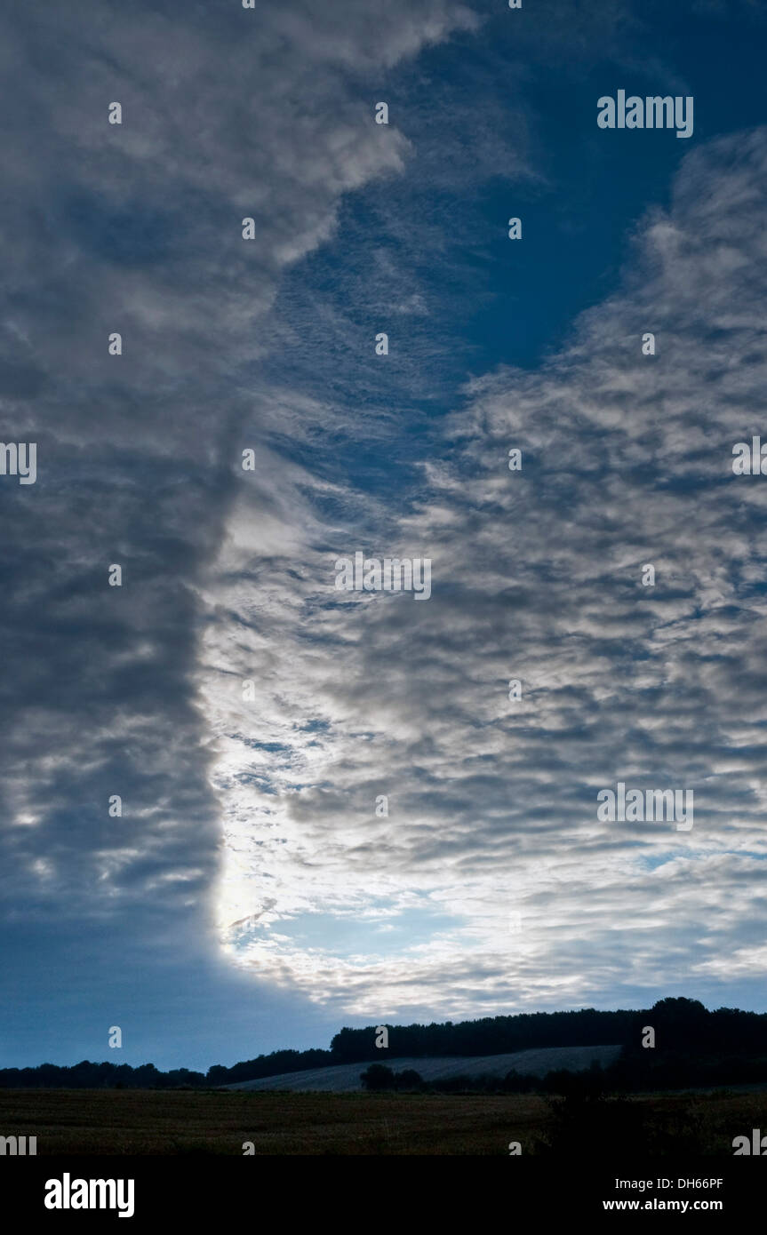 Advancing 'cold front' with Mackerel sky / Altocumulus clouds - France. Stock Photo