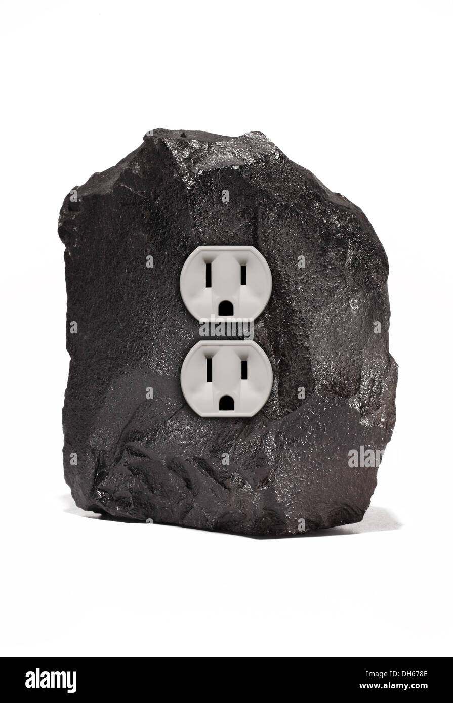 A large piece of black coal with an double electrical outlet. White background Stock Photo