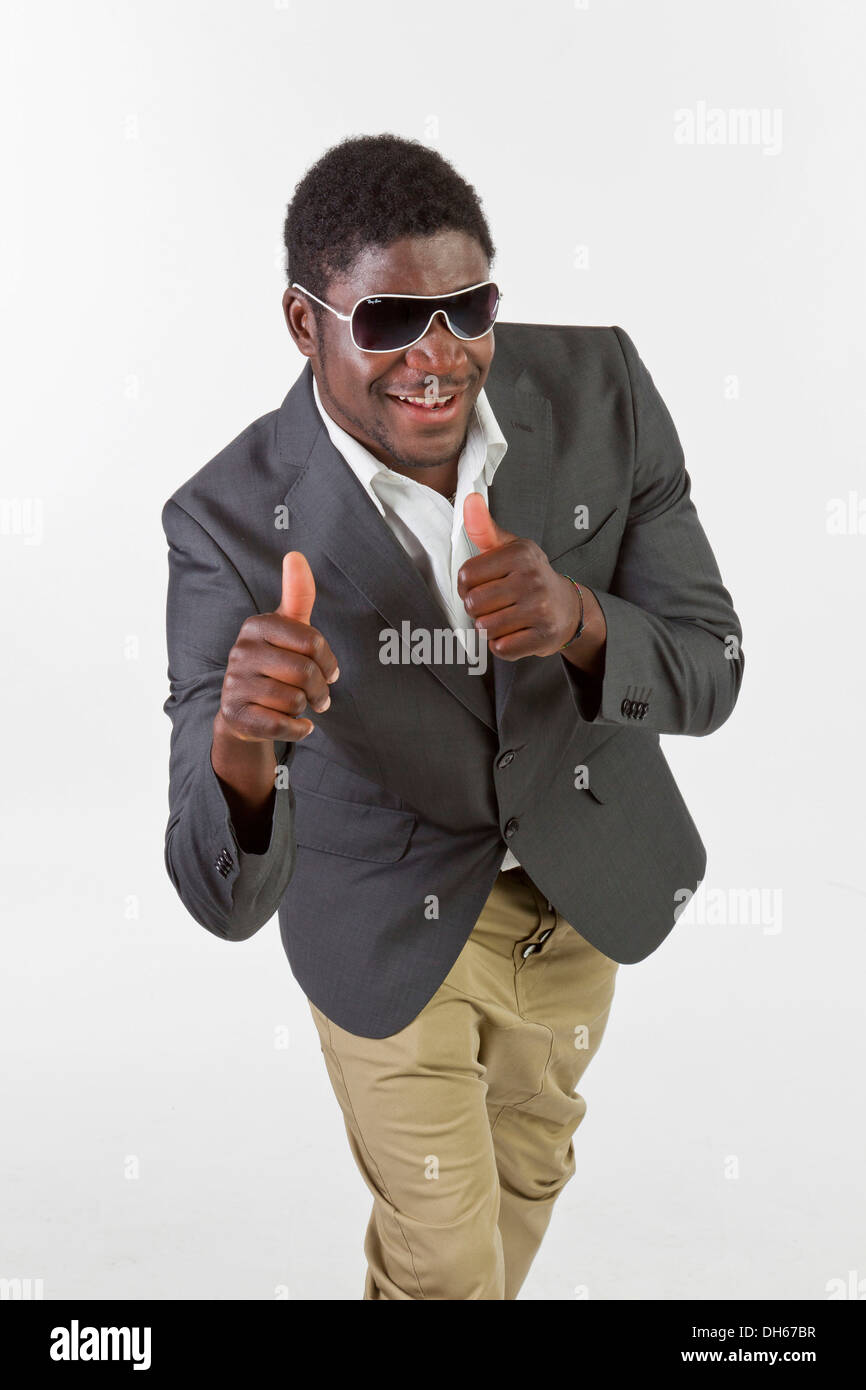 Young black man with sunglasses giving a thumbs up Stock Photo