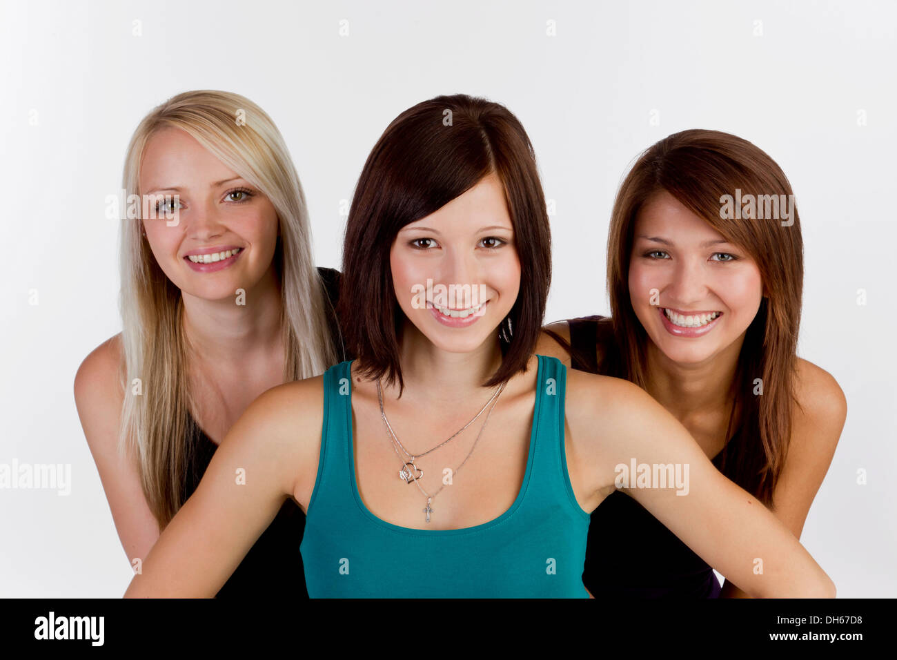 Three smiling young women Stock Photo