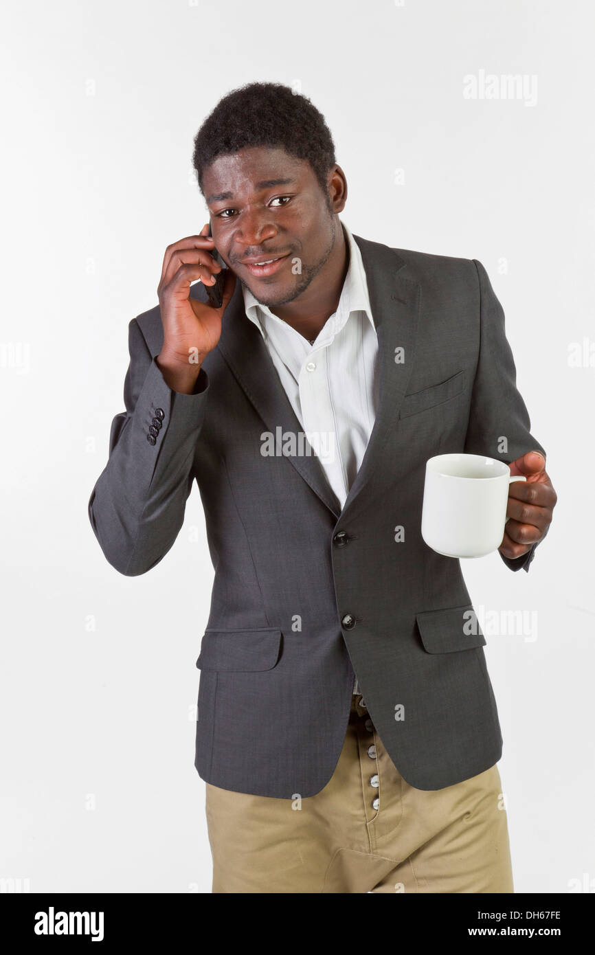 Young black man using a mobile phone Stock Photo