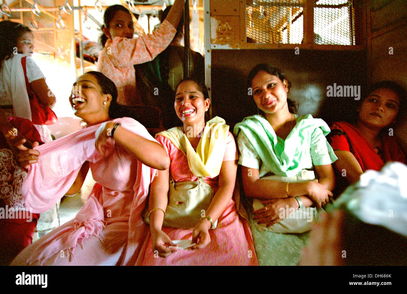 Ladies Special, train for women from the Indian Western Railway Company, befriended women celebrating joyously on the train on Stock Photo