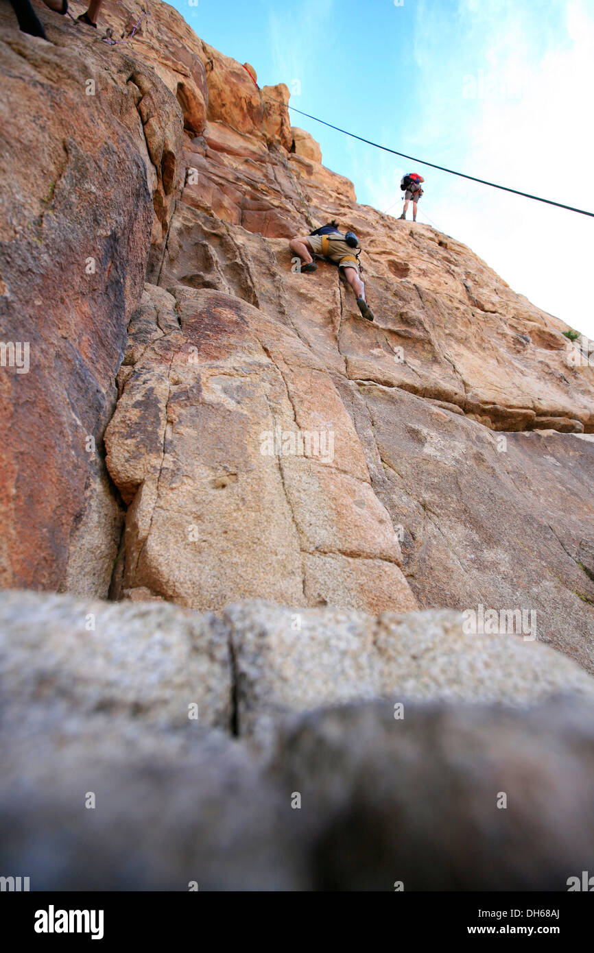 Climbers climbing the Thin Wall climbing route in Joshua Tree National