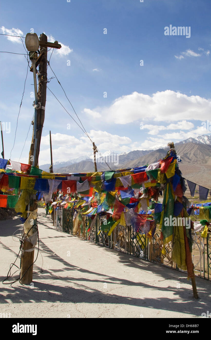 Tibetan Buddhist monastery with prayer flags in the Himalayan region