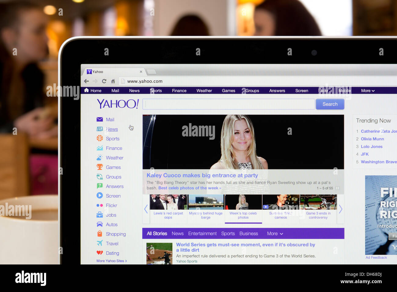 The Yahoo website shot in a coffee shop environment (Editorial use only: print, TV, e-book and editorial website). Stock Photo