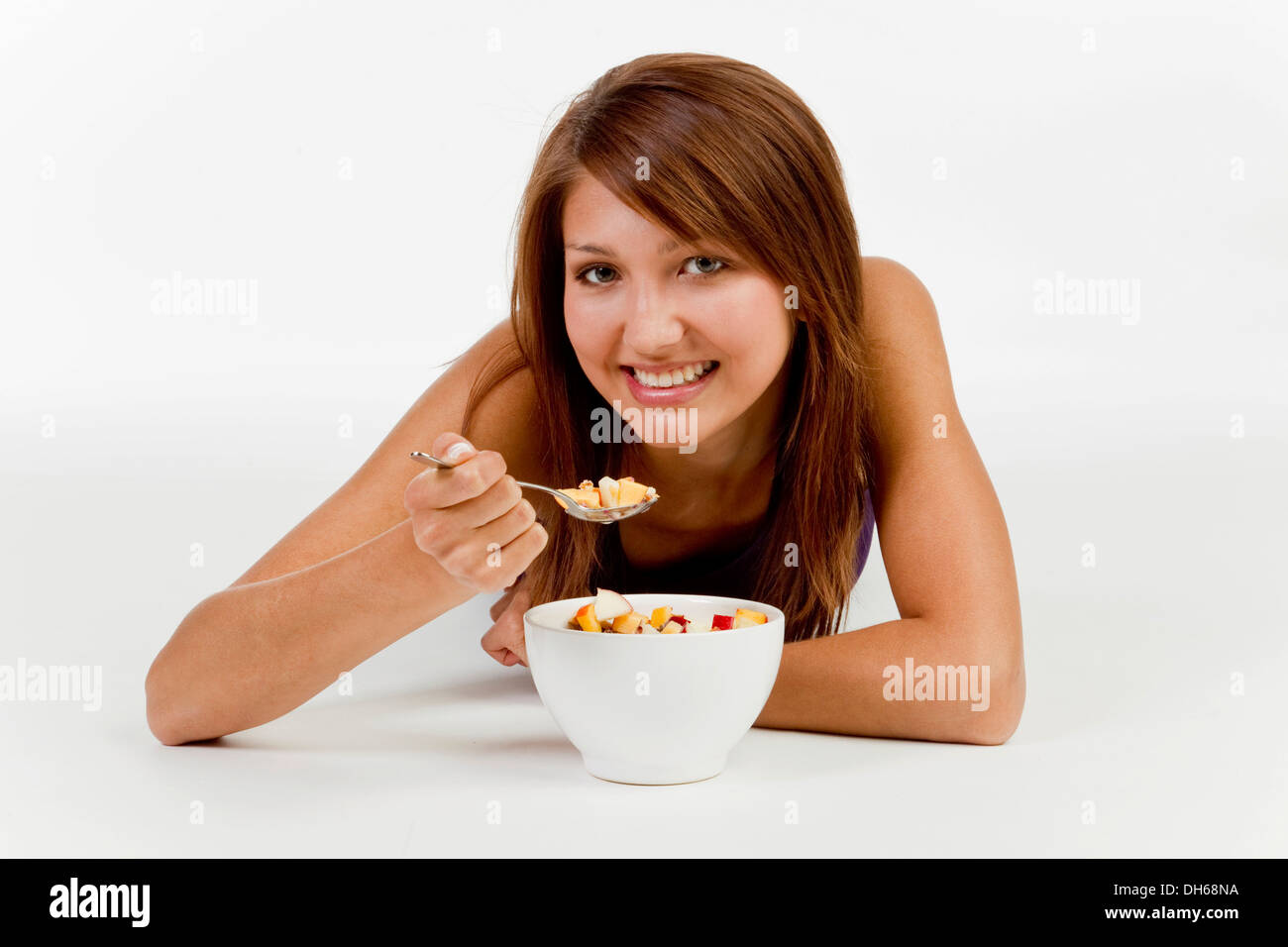 Young woman with a bowl of cereal Stock Photo