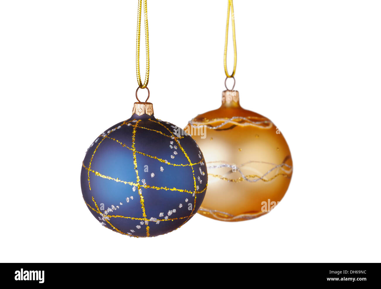 Christmas decoration. Blue and yellow balls on white background. Selective focus Stock Photo