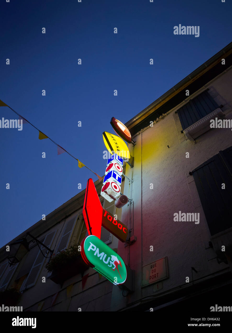 Neon signs on a facade in Laruns, western Pyrenees, France, Europe, PublicGround Stock Photo