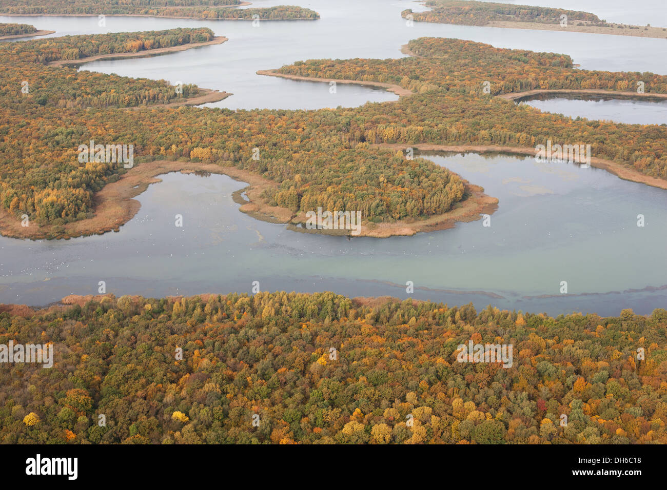 AERIAL VIEW. Curvy lakeshore of Lake Madine; a reservoir near the village of Montsec, Meuse, Lorraine, Grand Est, France. Stock Photo