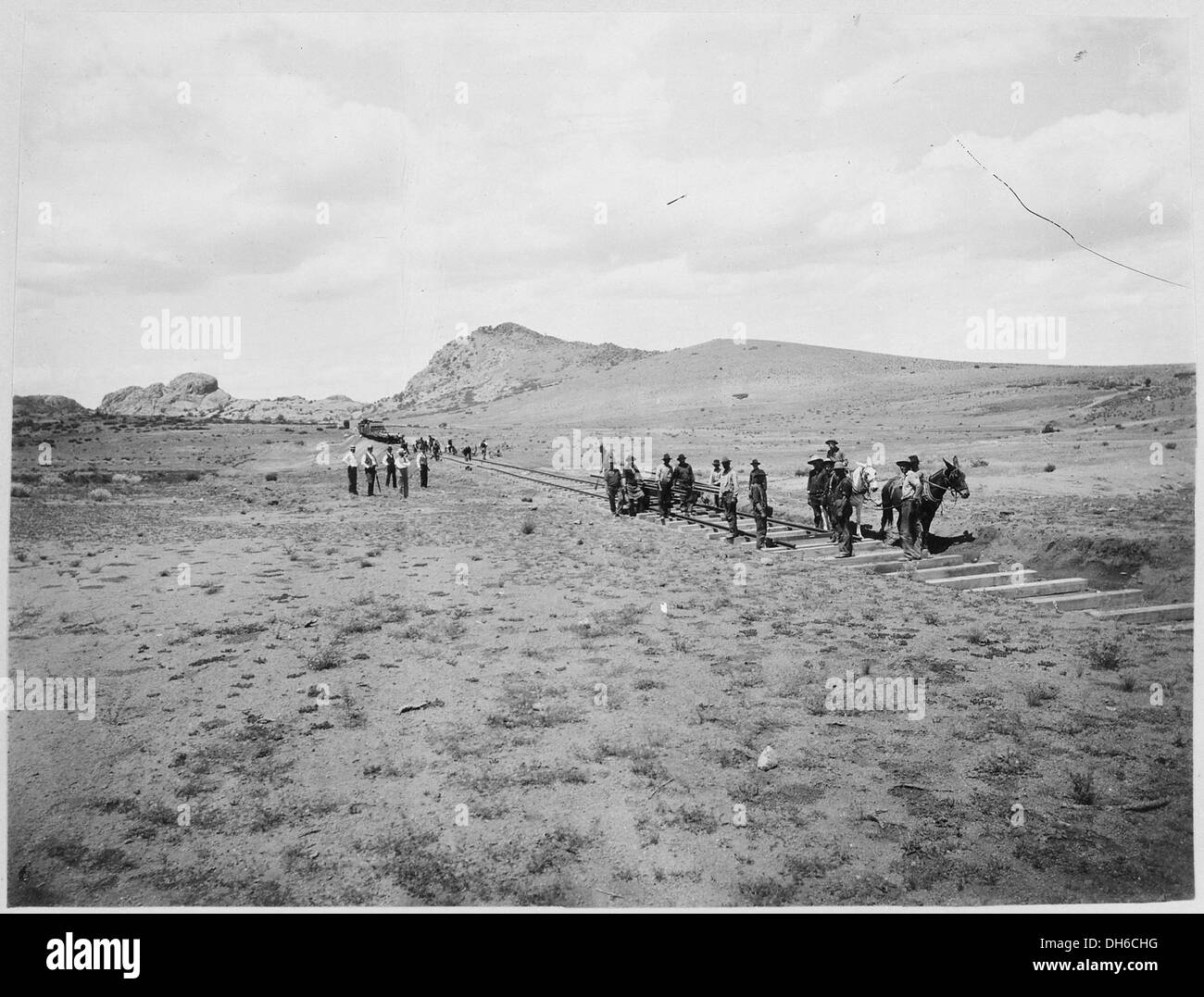 Laying tracks on the extreme front of Prescott and Eastern Railroad in Arizona Territory, ca. 1898 522969 Stock Photo