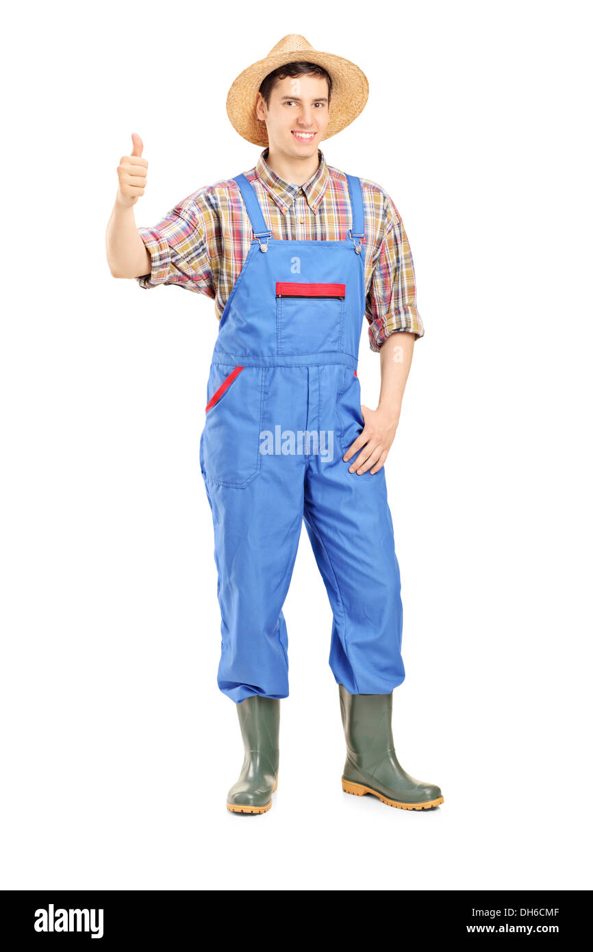 Full length portrait of a young smiling farmer giving a thumb up Stock ...