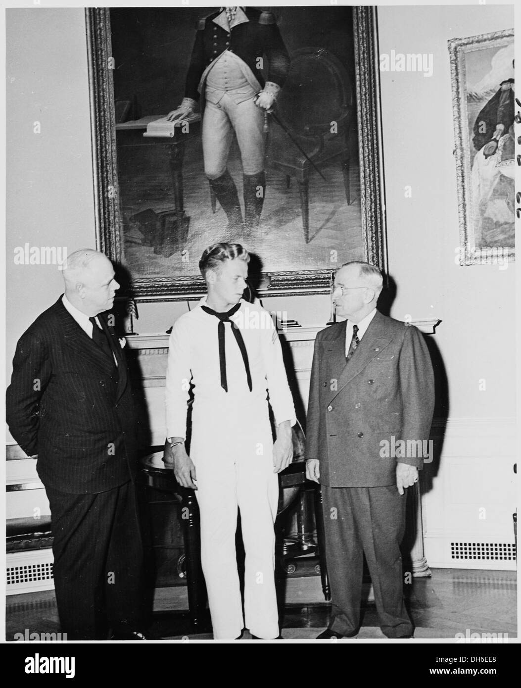 President Harry S. Truman is seen in the Oval Office with White House ...