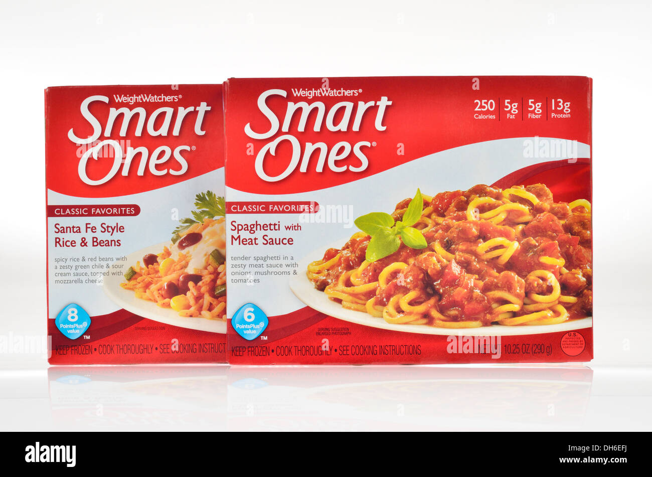 Unopened boxes of Weight Watchers Smart Ones frozen dinners on white background, cutout. USA Stock Photo