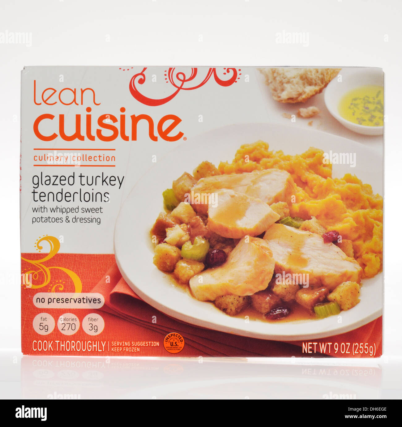 Unopened box of Lean Cuisine glazed turkey tenderloins frozen dinner entree on white background, cutout. USA Stock Photo