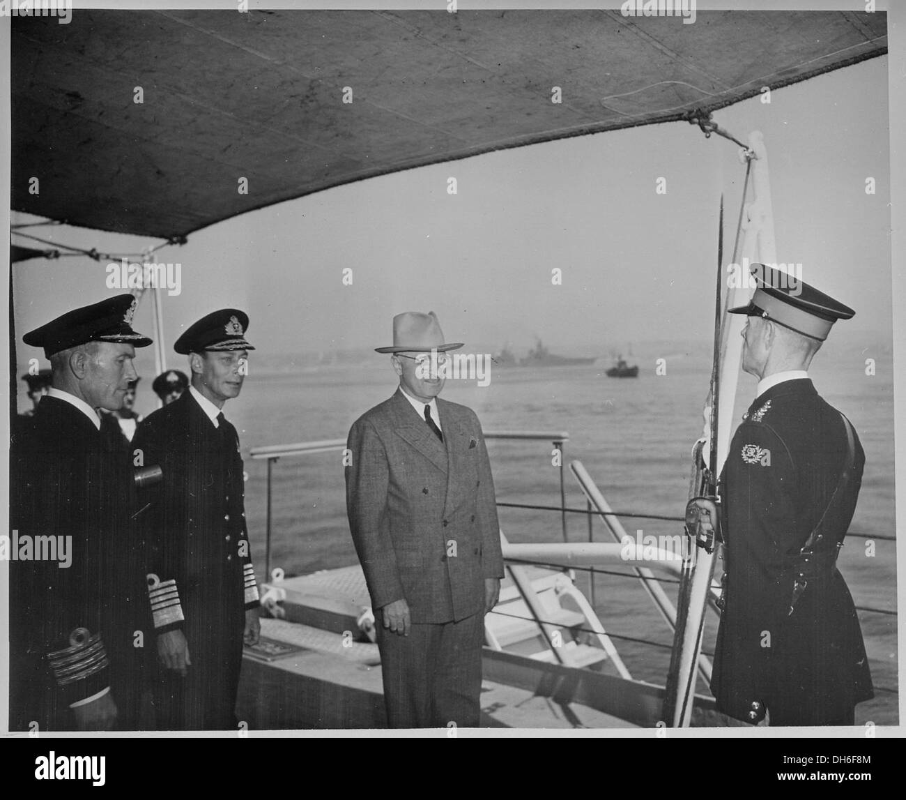 President Harry S. Truman and King George VI of England on the quarterdeck of the H. M. S. Renown where the President... 198712 Stock Photo