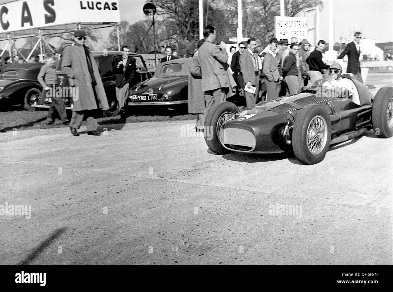 Peter Collins In A Brm V16 Mk Ii Driving Into The Paddock At Goodwood England 1855 Stock Photo Alamy