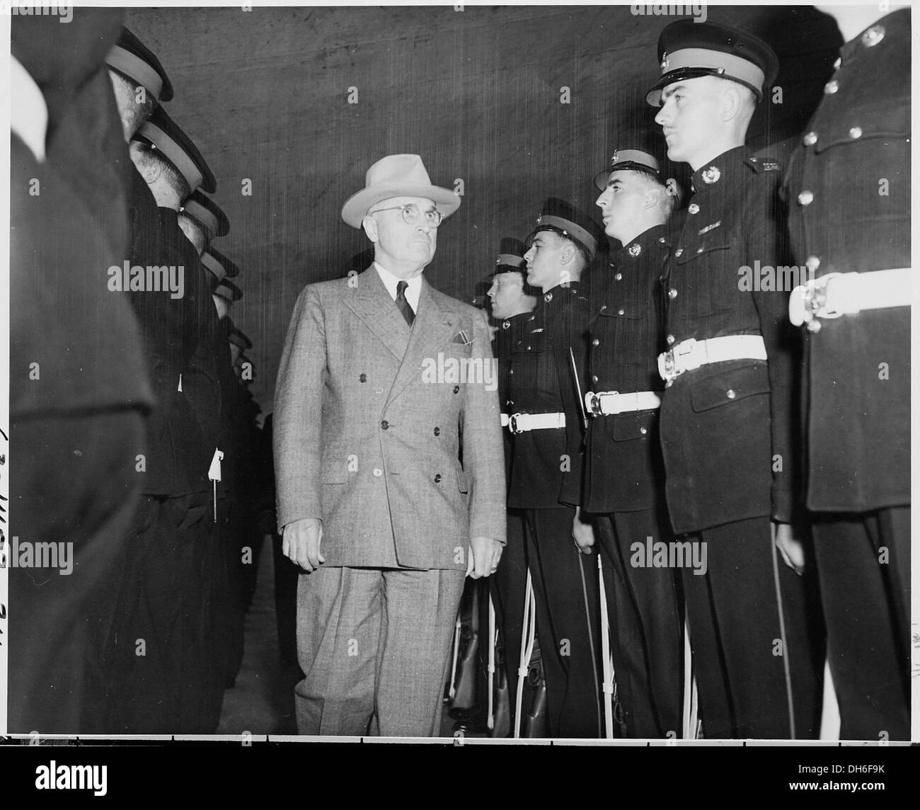 President Harry S. Truman inspects the Marine Guard on board the H. M. S. Renown where he is visiting with King... 198714 Stock Photo
