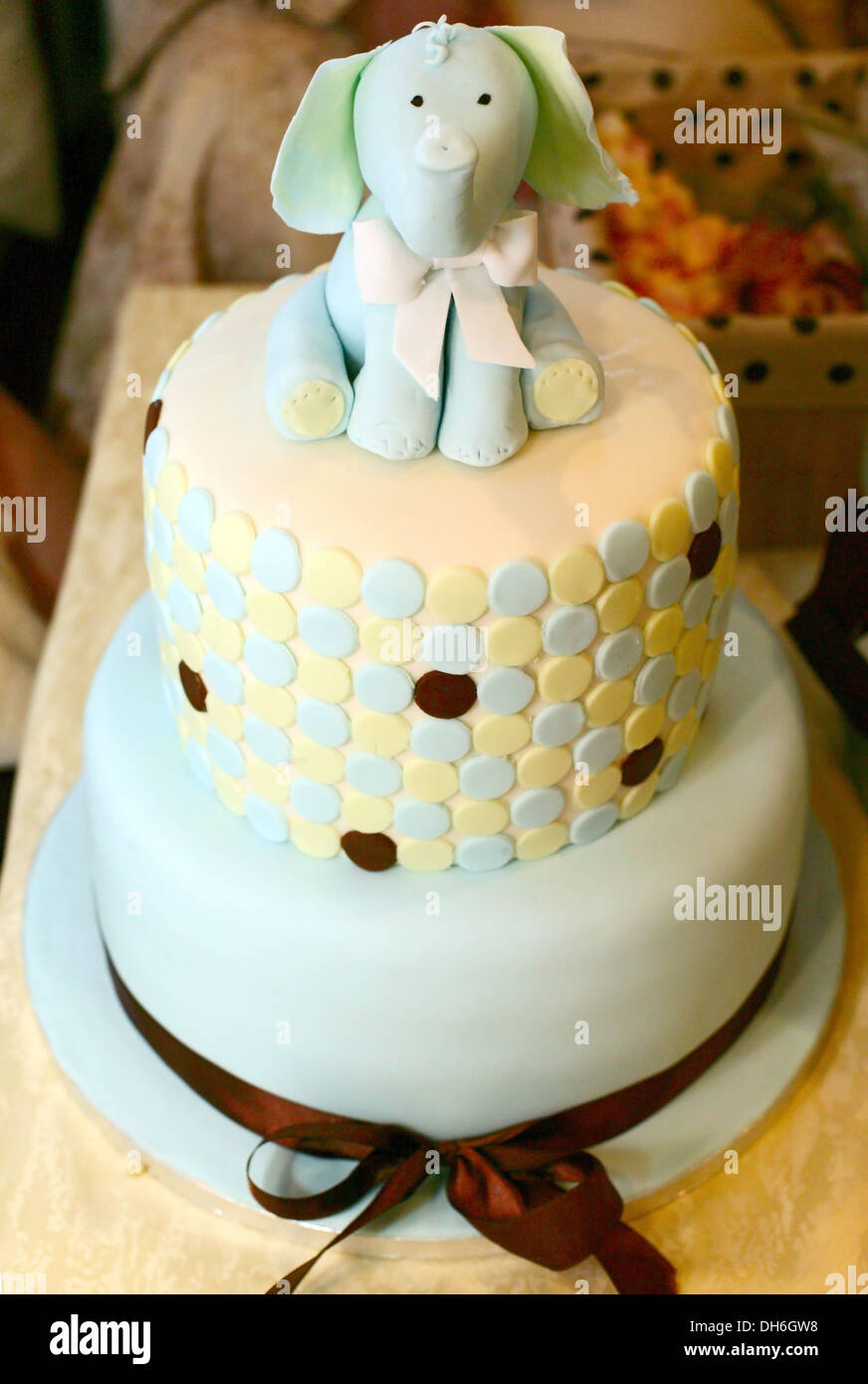 Tasty celebration cake decorated with elephant figure Stock Photo