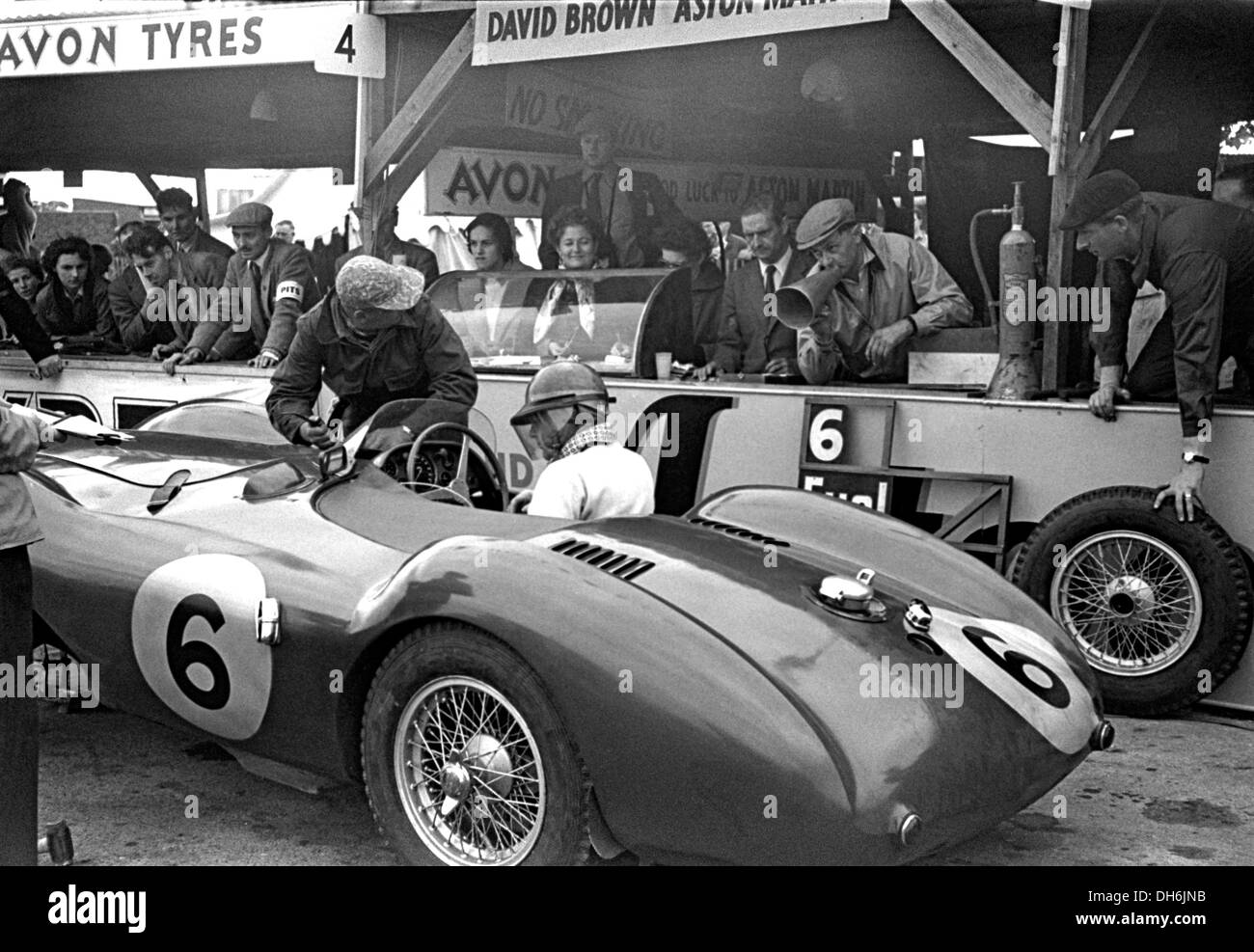 Pat Griffiths and Peter Collins Aston Martin DB3S, one of the David Brown works team cars in the pits at Goodwood, England 1953. Stock Photo