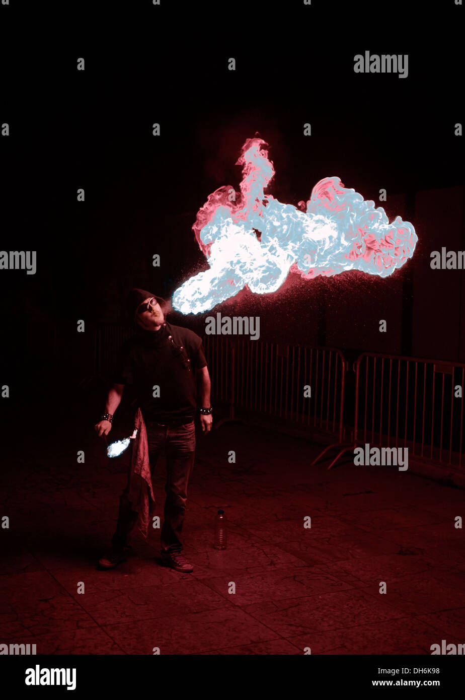 Fire eater at night Stock Photo