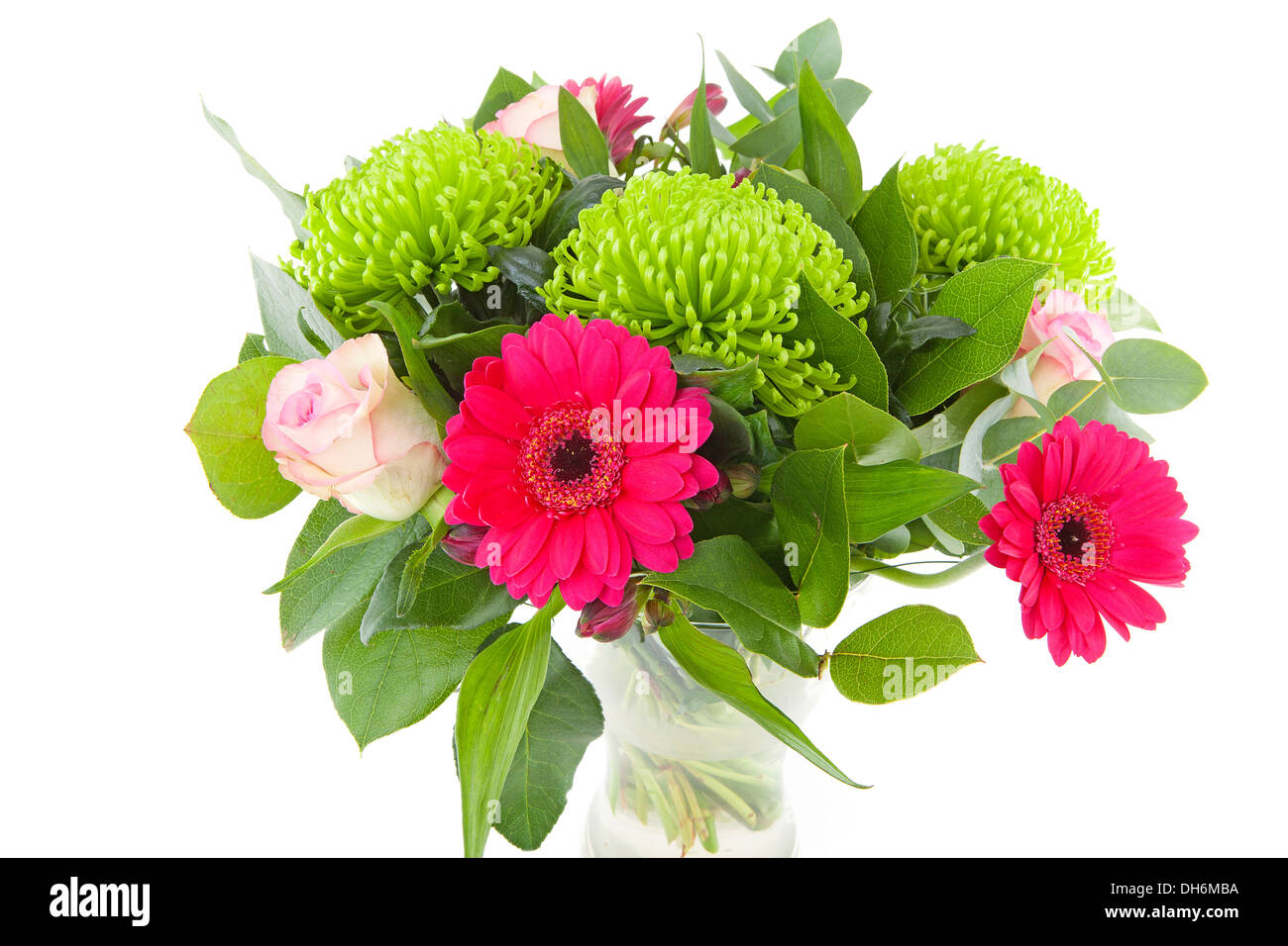 Bouquet of pink flowers in vase over white background Stock Photo - Alamy