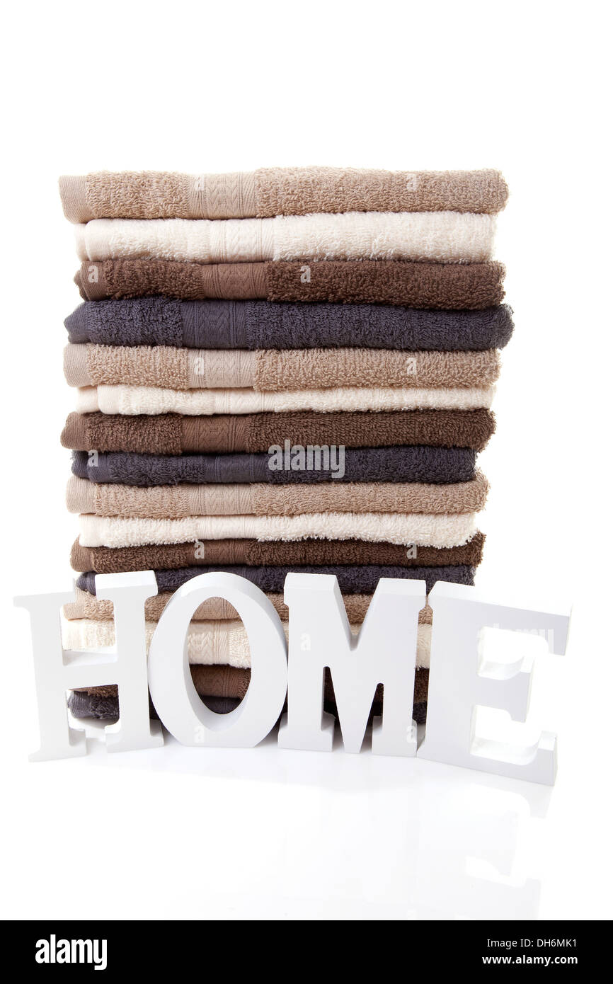 Pile of towels over white background Stock Photo - Alamy