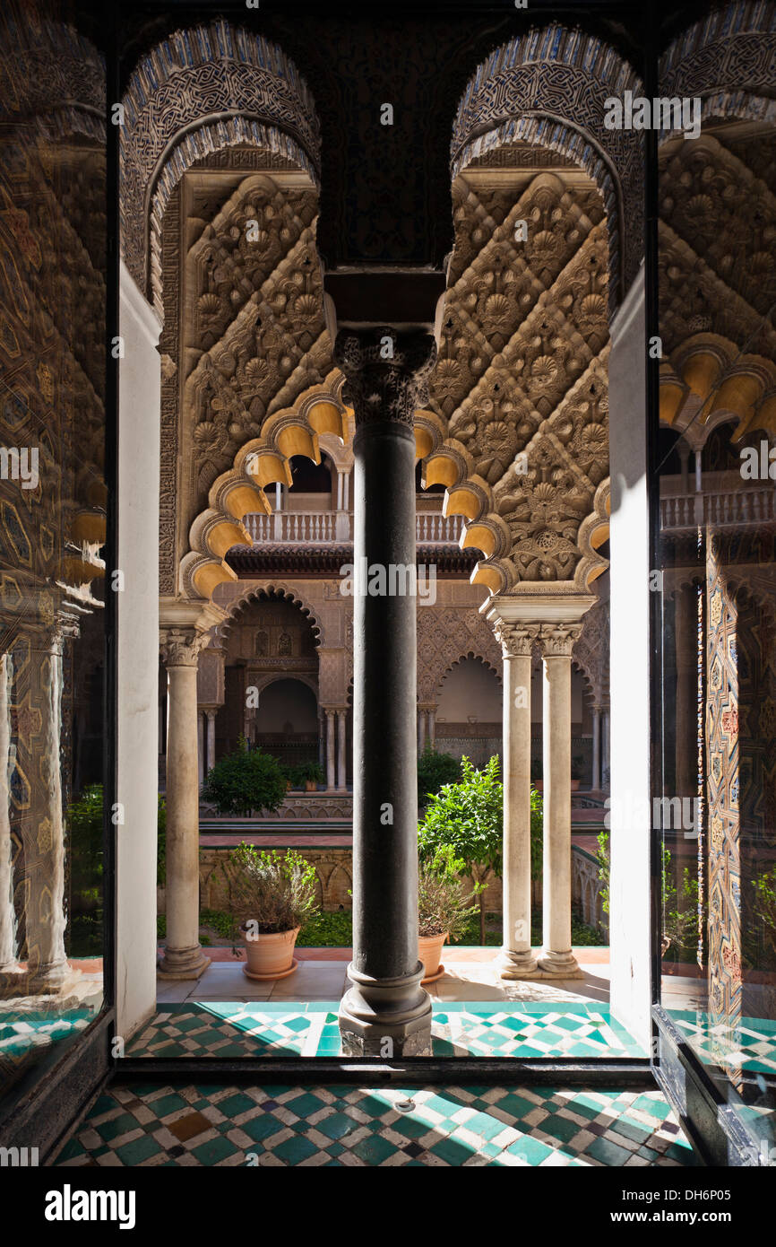 Arched passage at Real Alkazar of Seville, Spain Stock Photo