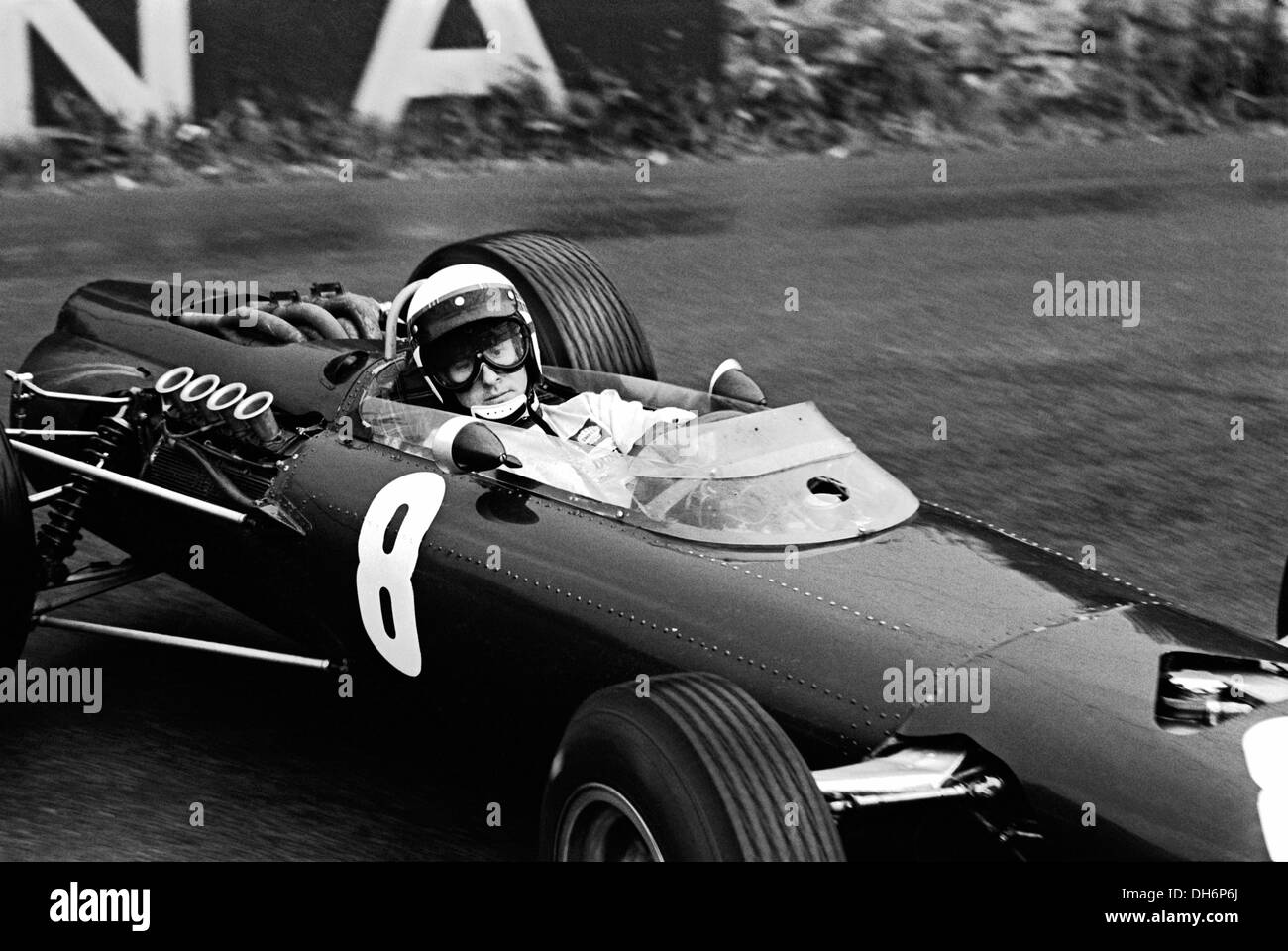 Jackie Stewart racing in his BRM P261 enters La Source hairpin at Spa Francorchamps, Belgium 13 June 1965. Stock Photo