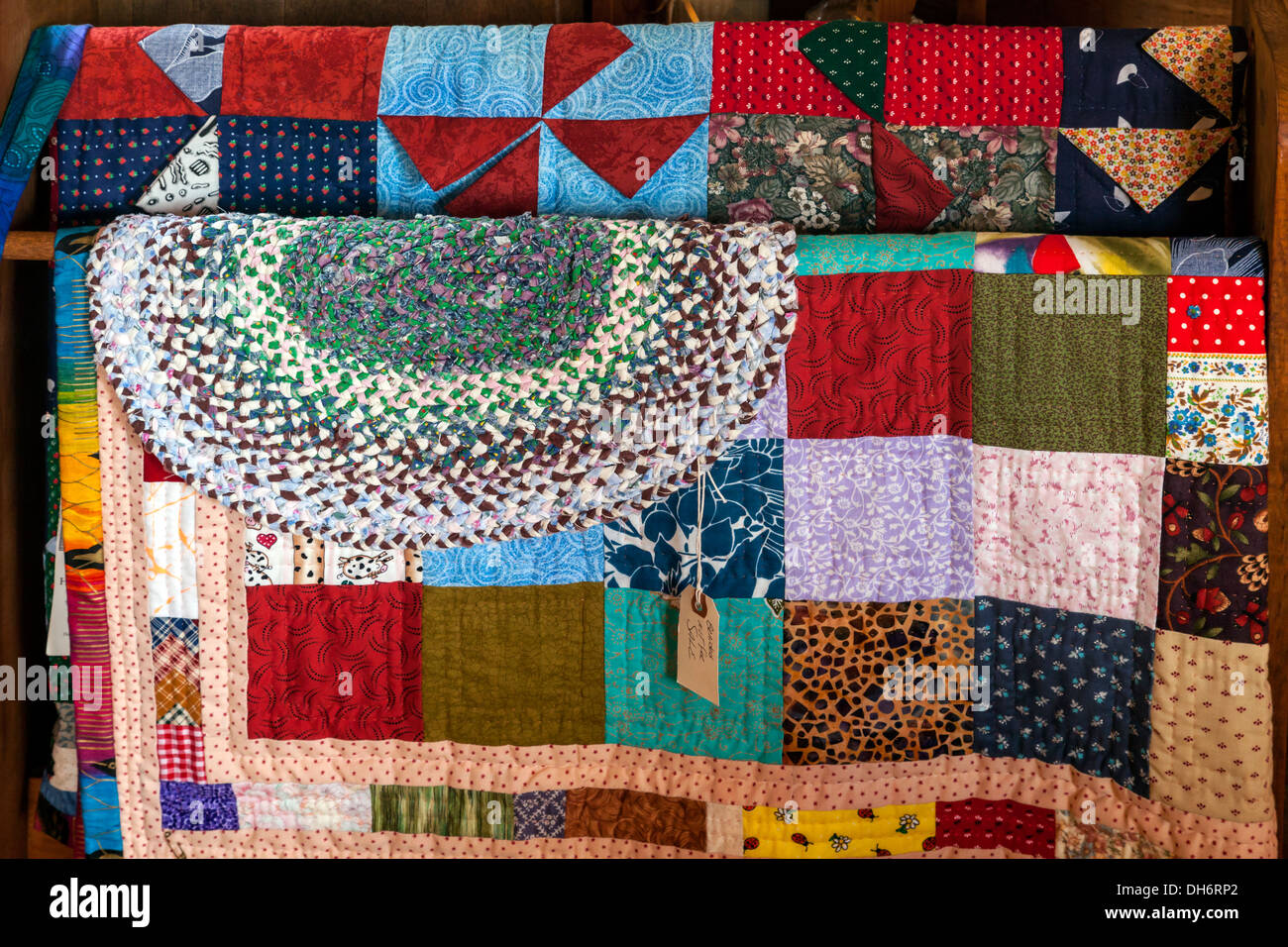 Colorful checkerboard patchwork quilts and hand woven rag rug. Newberry,  Florida USA Stock Photo - Alamy