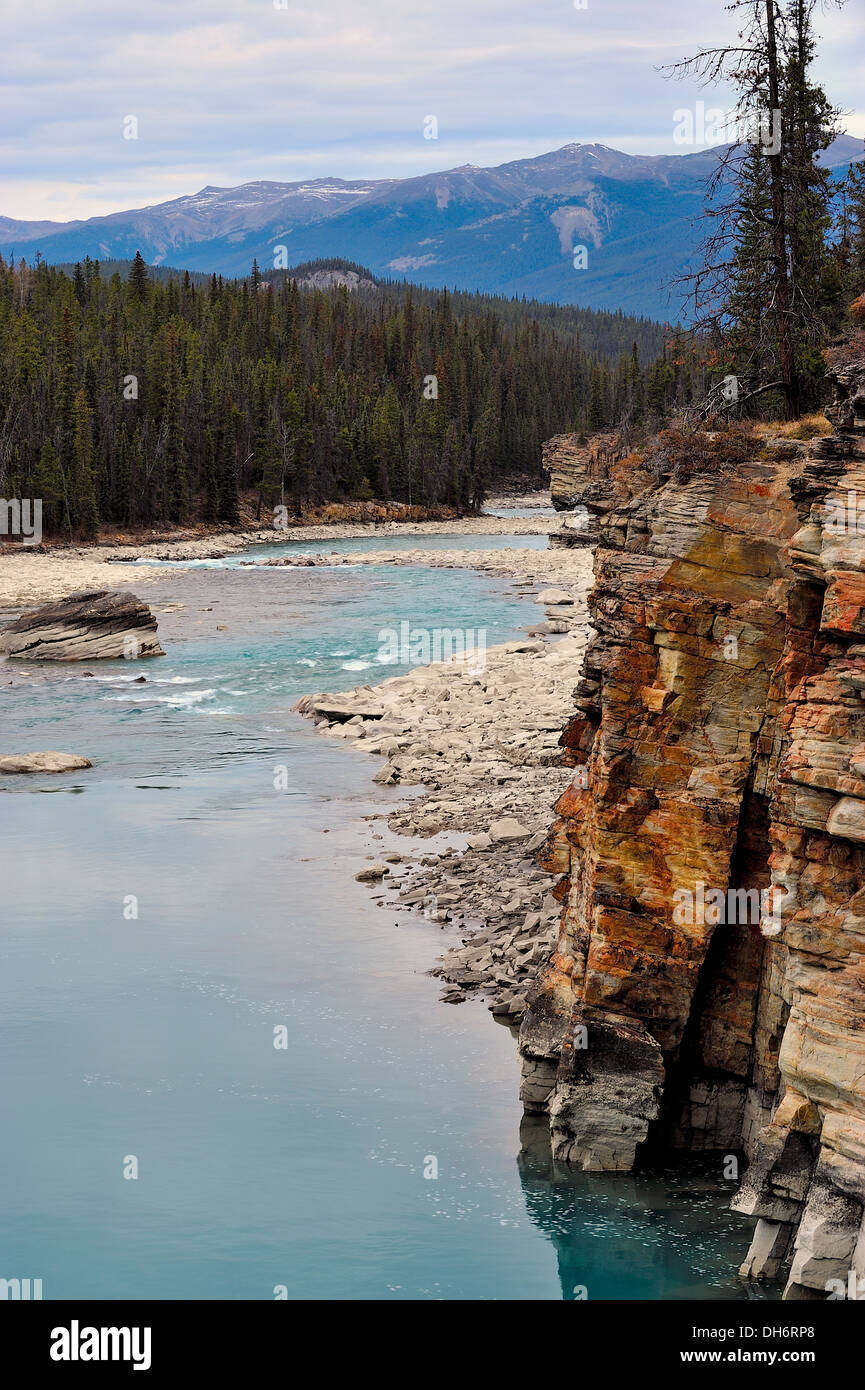 A vertical image of  the Athabasca river in Jasper National Park Stock Photo