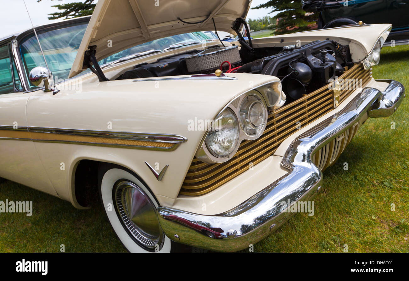 Plymouth Fury, Classic American Custom Car, seen at Show and Shine in Granum Alberta, hood up on cream coloured Stock Photo