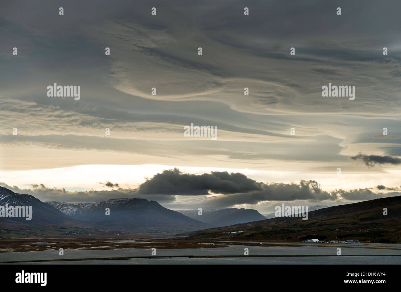 Lenticular clouds above Akureyri Iceland Europe Stock Photo