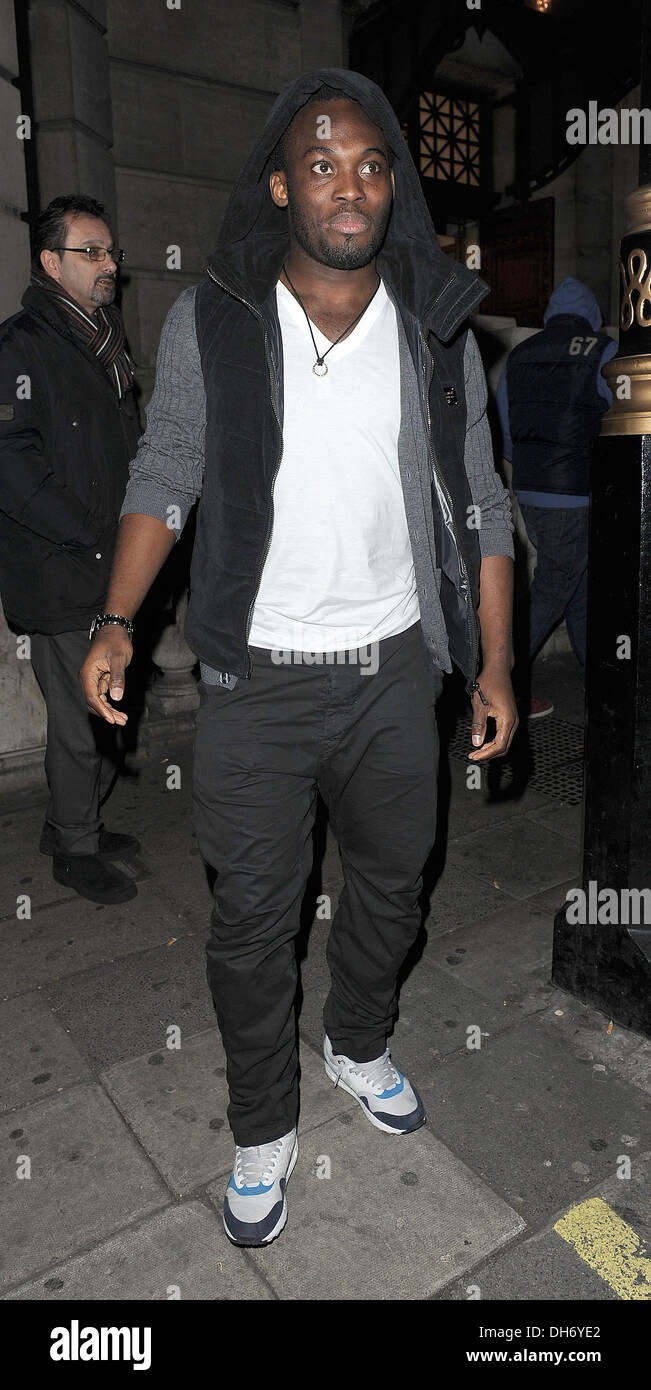 Chelsea FC footballer Michael Essien leaving Aura nightclub at 3.30am with other members of team following their 4-1 win over Stock Photo