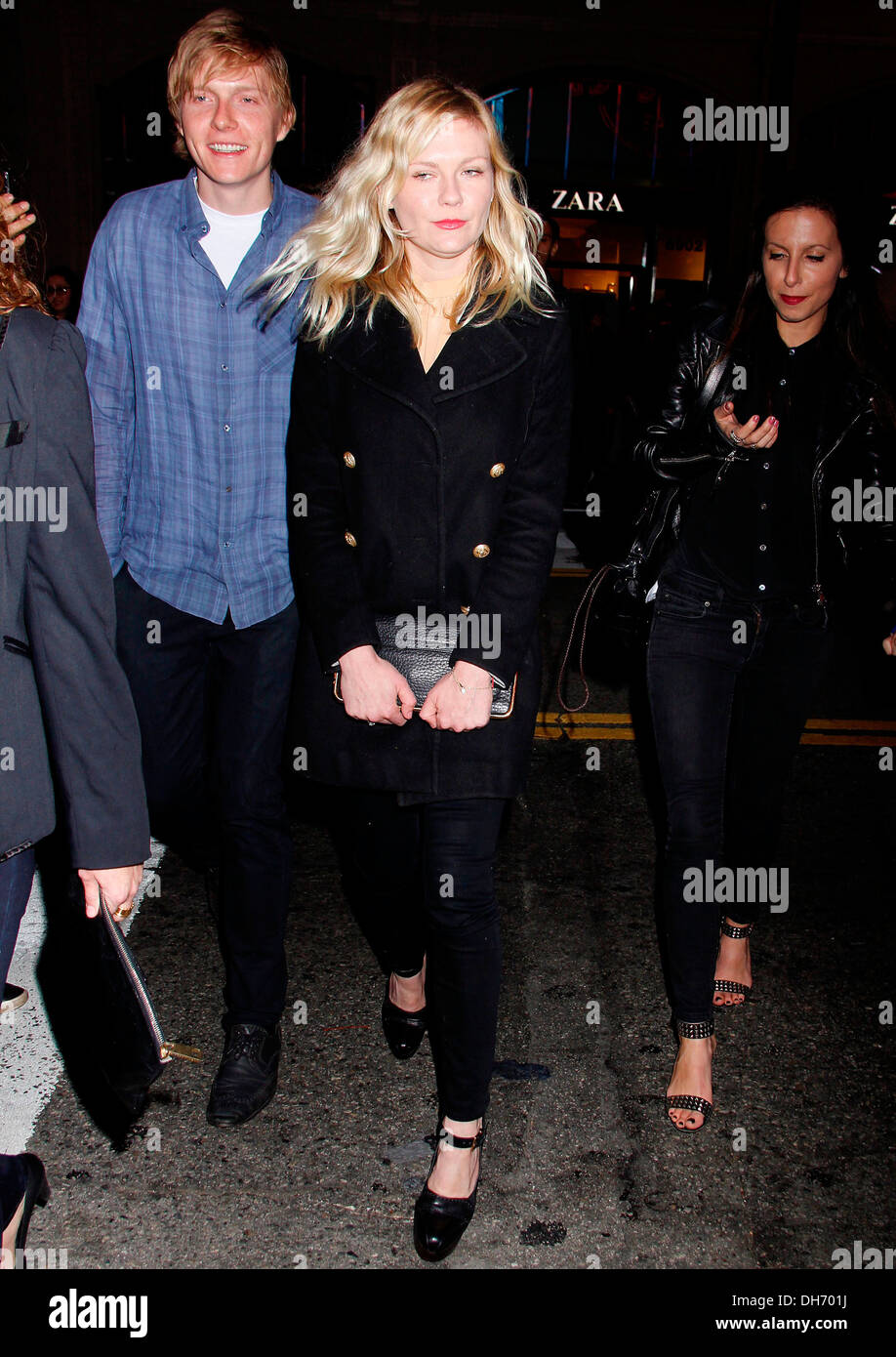 Kirsten Dunst and her brother Christian walking on Hollywood Boulevard