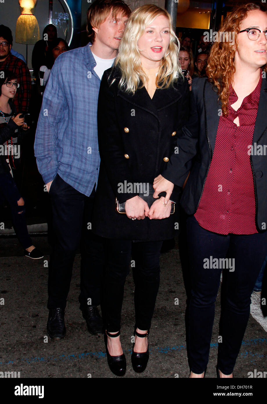 Kirsten Dunst and her brother Christian walking on Hollywood Boulevard