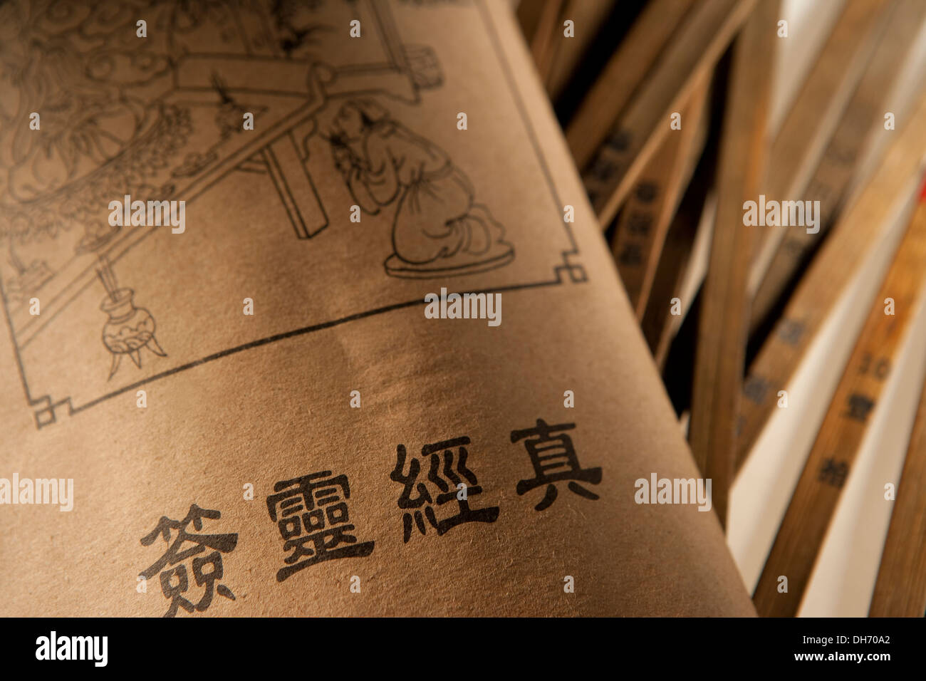 Chinese fortune telling book and sticks Stock Photo Alamy