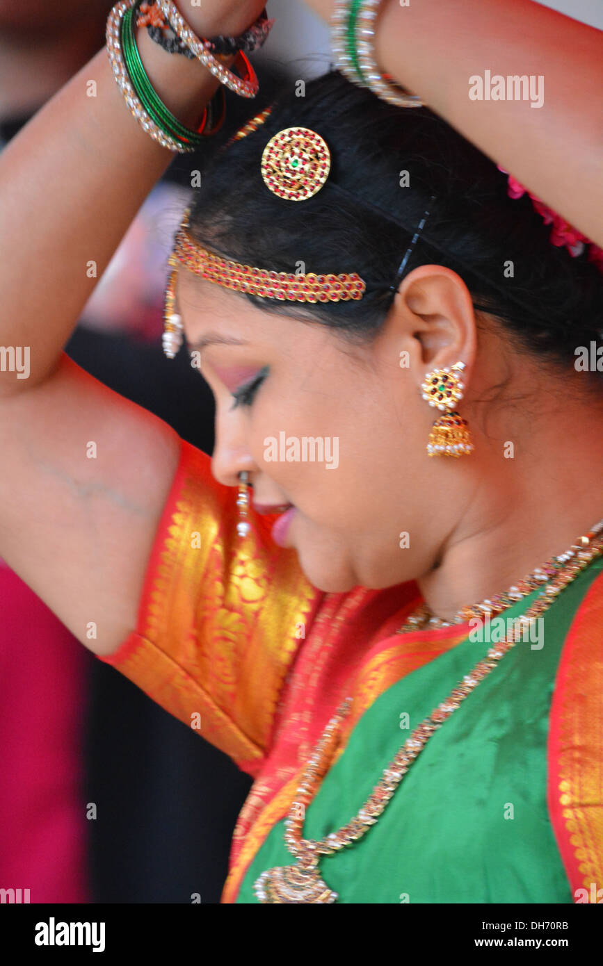 Hindu woman dancing, Diwali celebrations in Croydon High street, Surrey. Stock Photo