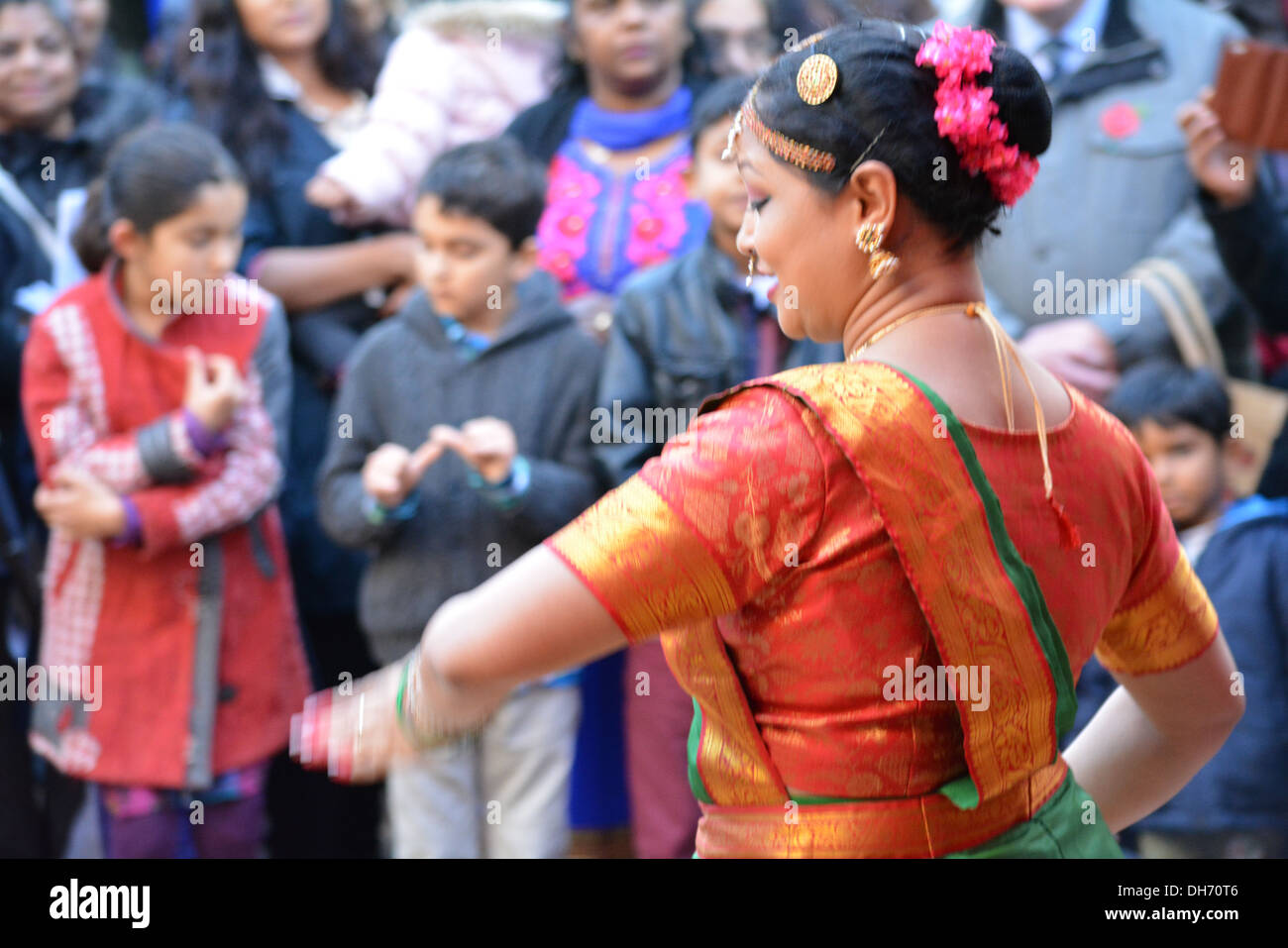 Hindu woman dancing, Diwali celebrations in Croydon High street, Surrey Stock Photo