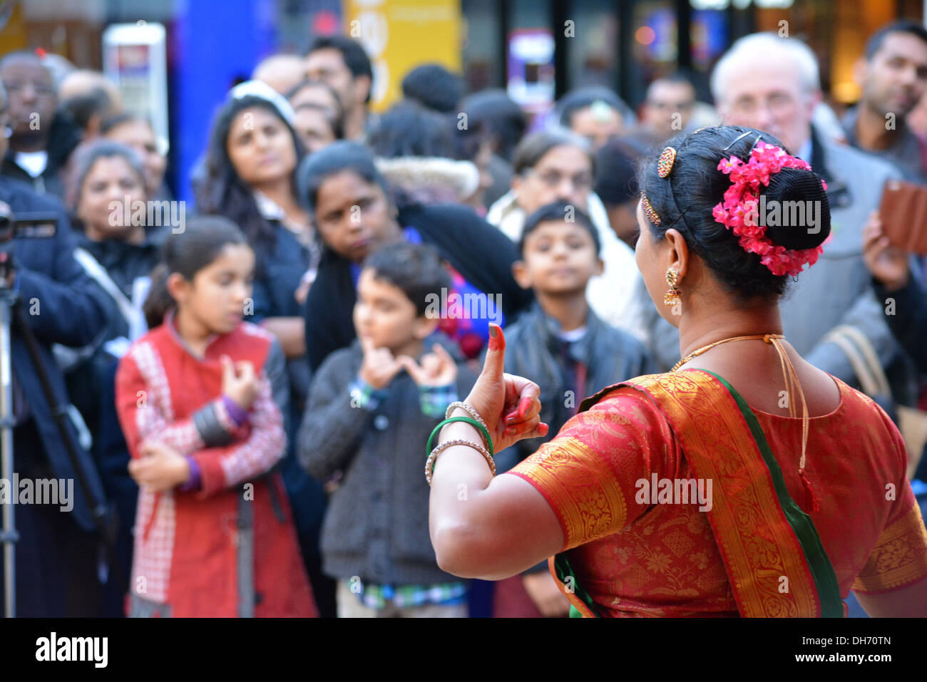 Hindu woman dancing, Diwali celebrations in Croydon High street, Surrey Stock Photo