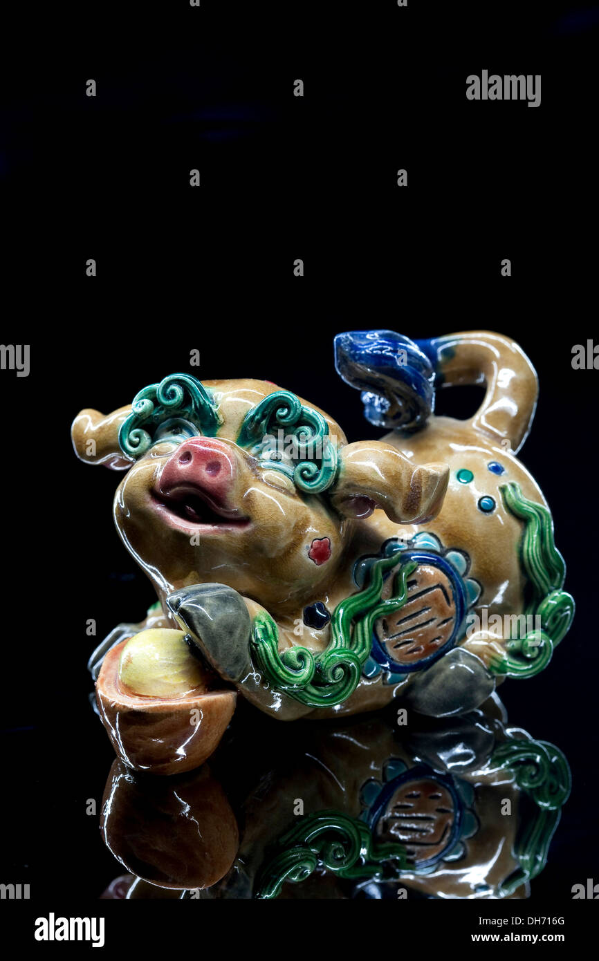 Traditional sculpture of Chinese zodiac sign, Pig Stock Photo Alamy
