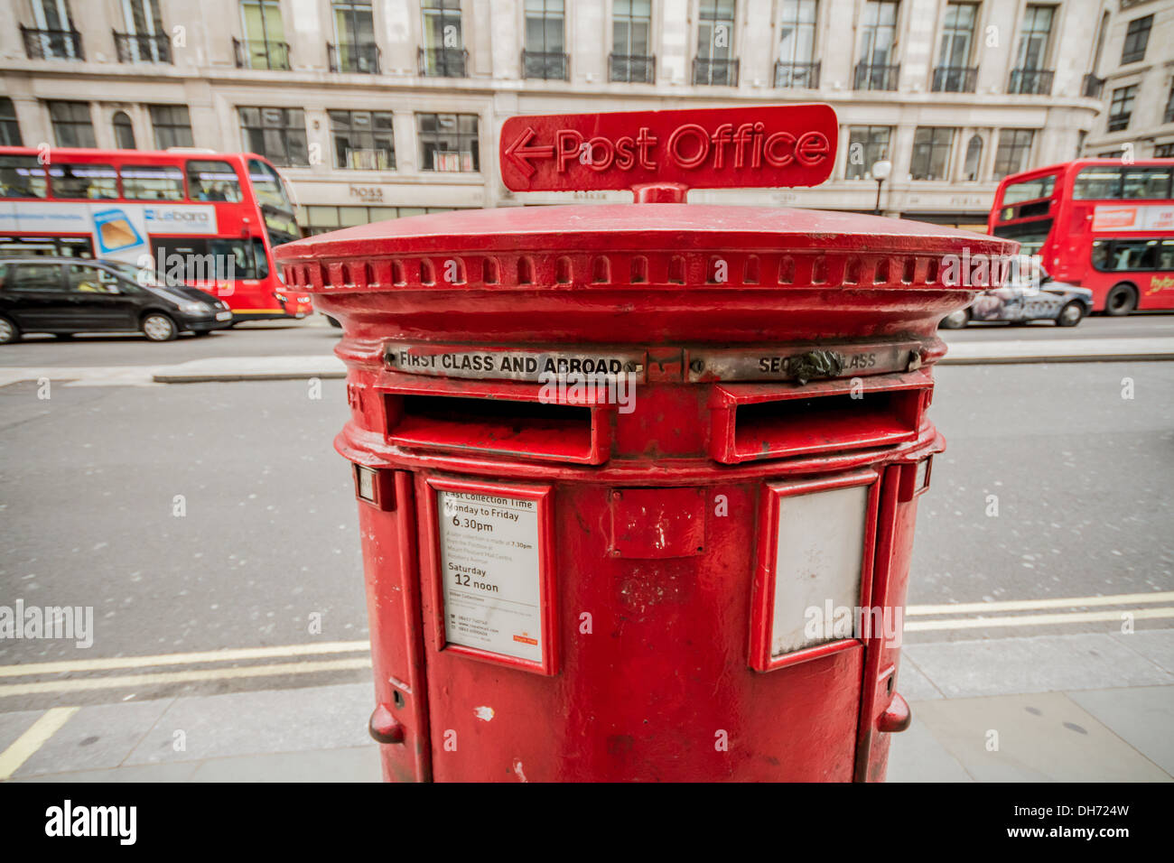 Traditional British red post box seen in London, UK Stock Photo - Alamy