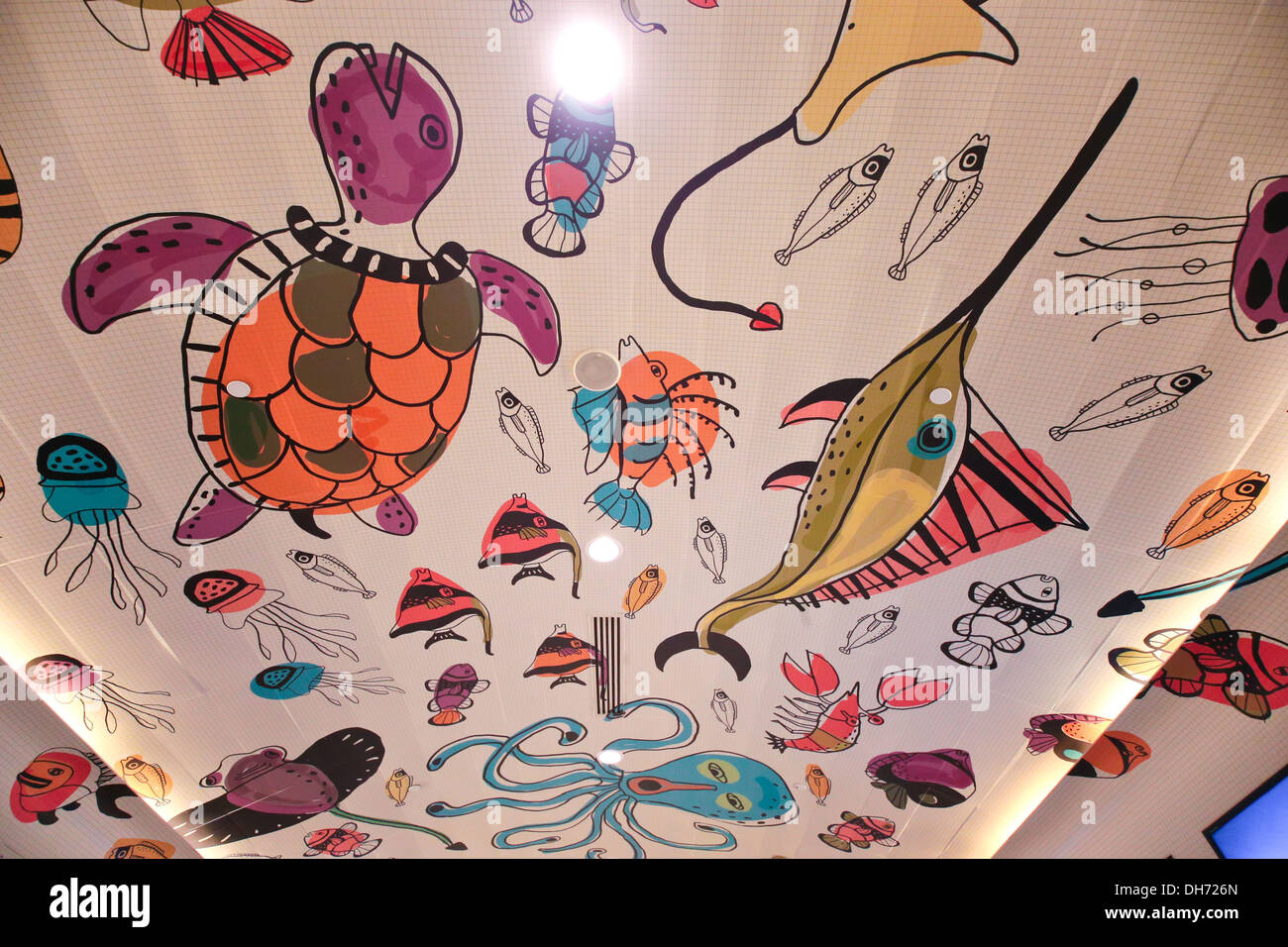 Sea creatures wall grafitti inside the pedestrian tunnel of Suria KLCC, Malaysia. Stock Photo