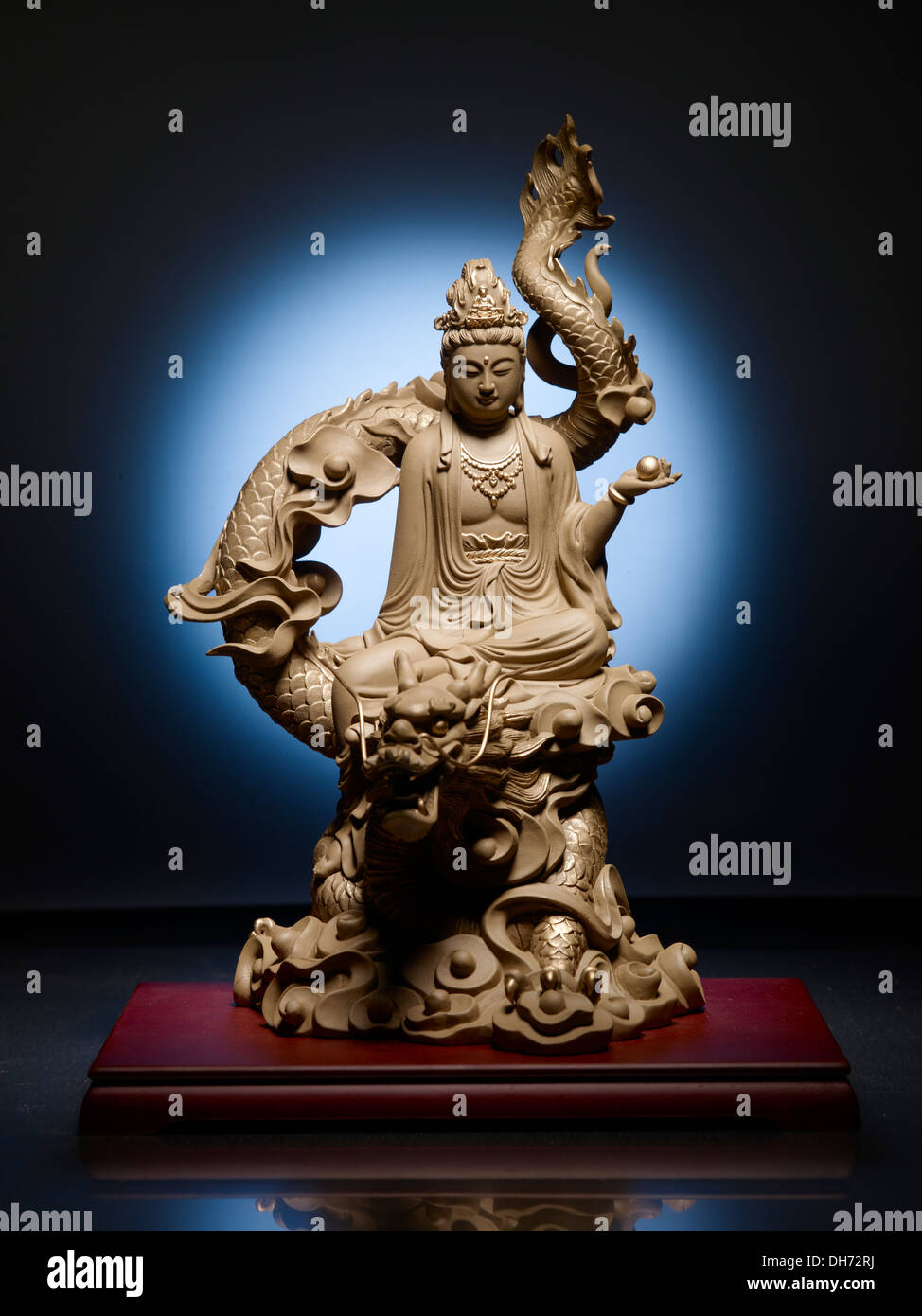 Statue of Kwan Yin Riding the dragon Stock Photo Alamy