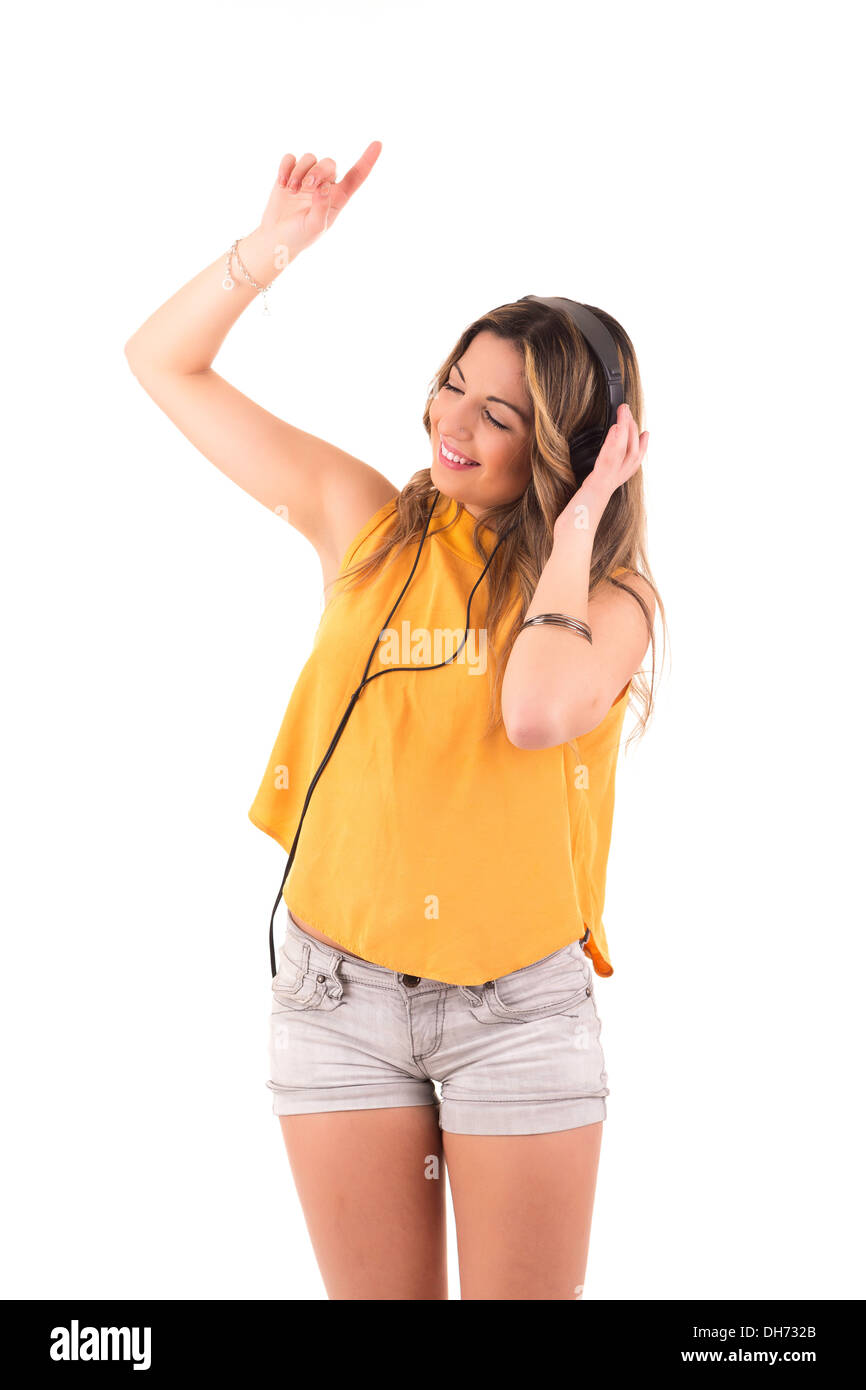 Happy young woman listening to music Stock Photo - Alamy
