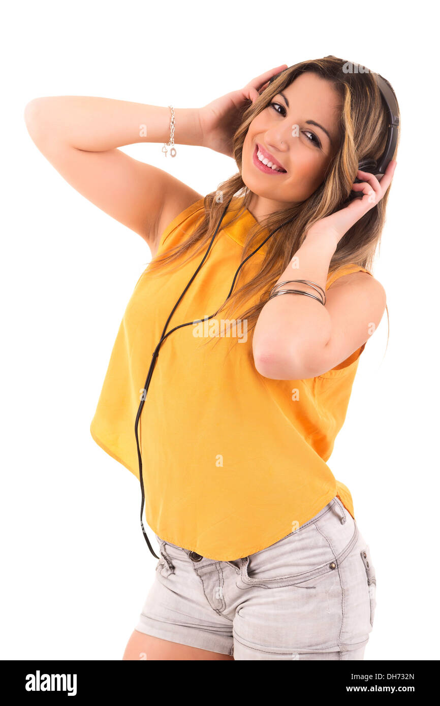 Happy young woman listening to music Stock Photo - Alamy
