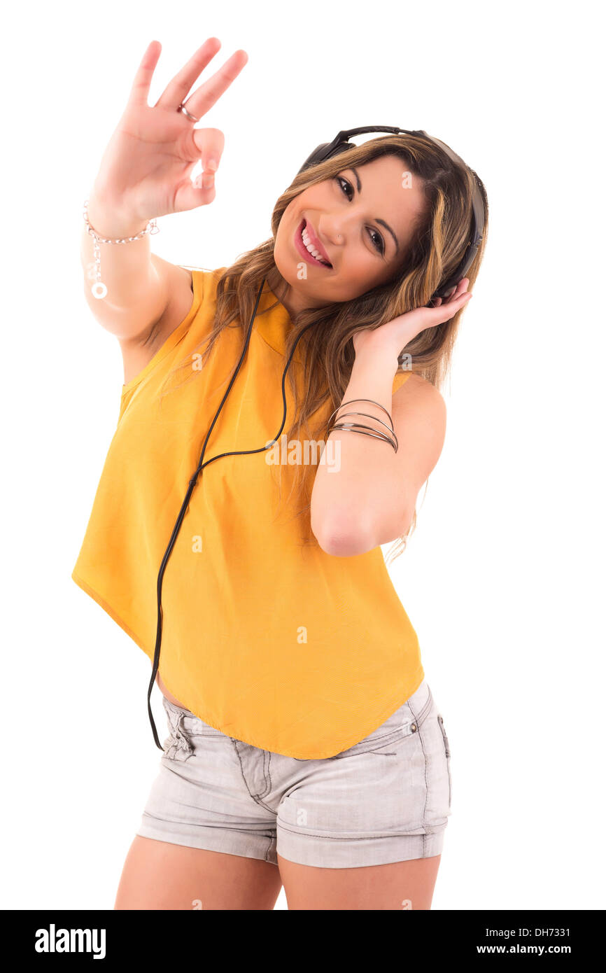 Happy young woman listening to music Stock Photo - Alamy