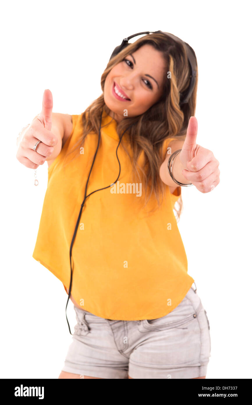 Happy young woman listening to music Stock Photo - Alamy